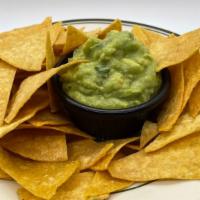 Guacamole With Chips · Homemade guacamole and crispy tortilla chips.