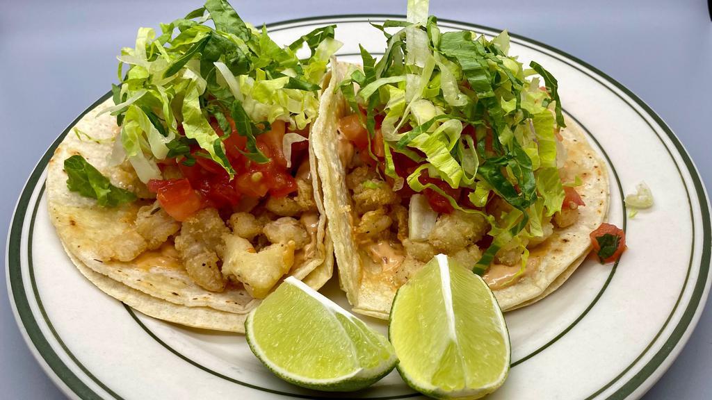 Crispy Fish Tacos · 2 Crispy fried fish tacos with chipotle mayo & pico de gallo.
