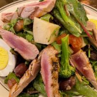 Niçoise Salad · Niçoise salad with fresh grilled tuna, hard boiled egg, broccoli, potatoes, tomatoes, olives...