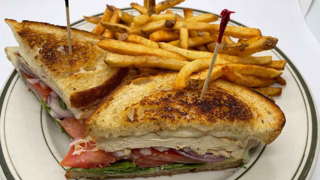 Grilled Chicken Sandwich · Grilled chicken with swiss, arugula, red onion, tomato & mayonnaise on amy's sourdough bread with french fries.