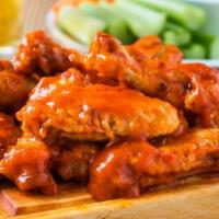 Buffalo Wings · Crispy on the outside, juicy on the inside chicken wings smothered with our sensational sauce.