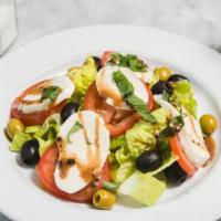 Caprese Salad · Fresh mozzarella, tomato, basil, balsamic vinaigrette, and olive oil. Come with choice of dr...
