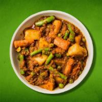 Heavenly Mixed Veggies(Vegan) · Seasoned vegetables mild, medium, or spicy in onion, tomato based sauce cooked at low heat, ...