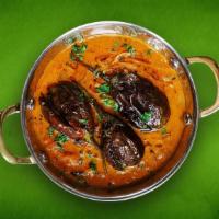 Eggplant Supreme(Vegan) · Fresh eggplant roasted in the tandoor, mashed, and marinated in a rich blend of Mughlai spic...