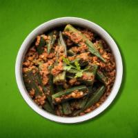 Old School Okra(Vegan) · Diced fresh okra, sautéed with onions, garlic and spices till crisp