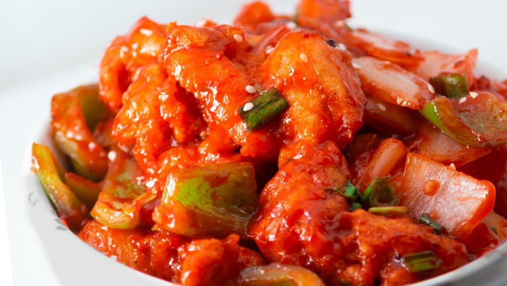 Chicken Chilli · Boneless chicken cooked with our special homemade chili sauce, tomato, onion and green pepper.