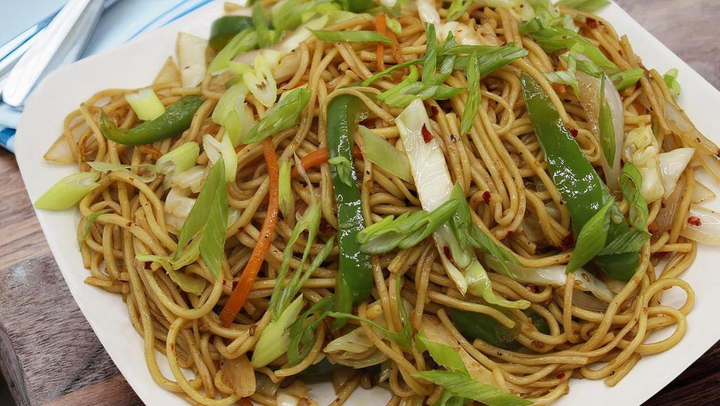 Veg Hakka · Traditional Hakka style Chinese noodles cooked with fresh vegetables.