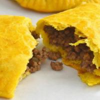 Beef Patty With Cheese · Jamaican Beef Patties Filled With Spicy Beef, Cheese In A Buttery Flaky Crust. Comes With A ...