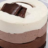 Chocolate Chocolate Trilogy · Chocolate Genoise Layered With Dark Chocolate, Milk Chocolate, & White Chocolate Mousse. Top...