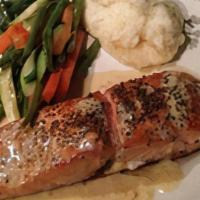 Wild, Mustard Encrusted Salmon · Wild caught salmon served with dijon mustard sauce, mashed potatoes, and veggie medley.
