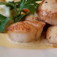 Scallops Dijon · Served with mashed potatoes and veggie medley.