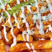 Fralley Fries · Seasoned fries, shredded buffalo chicken, guacamole, blue cheese crumbles, scallions, housem...