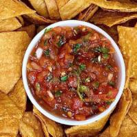 Chips & Salsa · Fresh fried chips and 5.5 ounces of our salsa.
