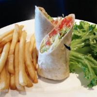 Mexican Wrap · Grilled chicken, lettuce, tomato, jalapeños, cheddar, sour cream & salsa.