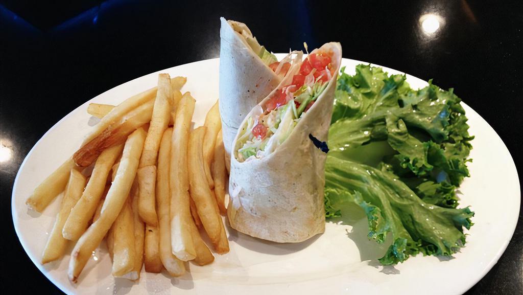 Buffalo Wrap · Fried chicken tenders tossed in hot sauce with lettuce, tomato & bleu cheese dressing.