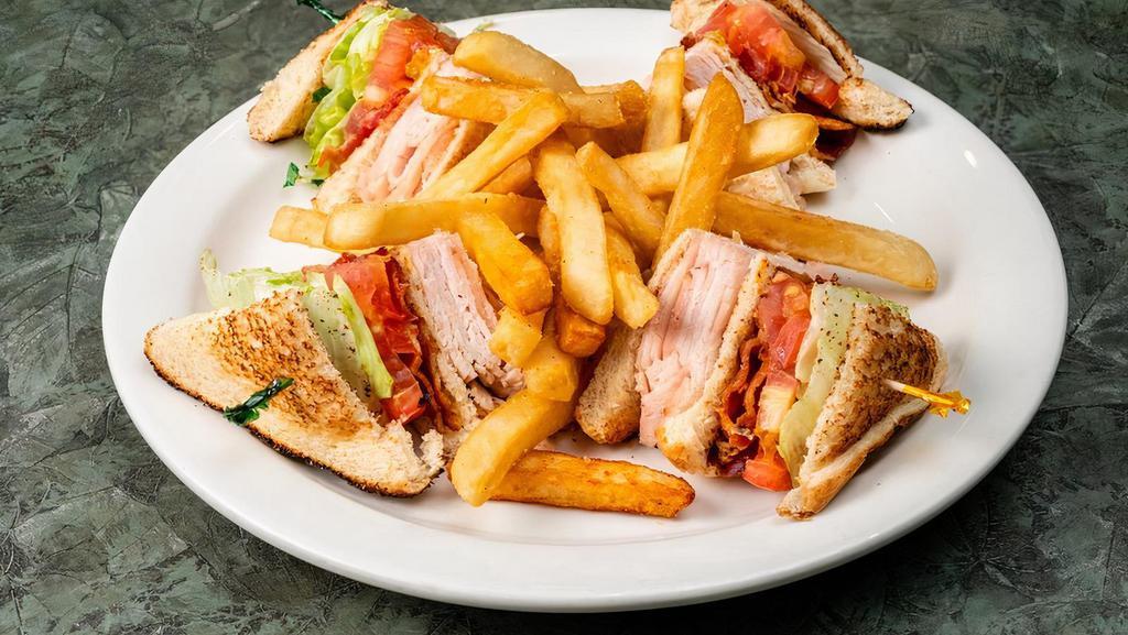  Turkey Club Sandwich · Triple decker with crisp bacon, lettuce, tomato & mayo.