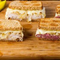 The Pastrami Melt · Classic pastrami sandwich with chipotle beef, grilled onions, Muenster cheese, chipotle mayo...