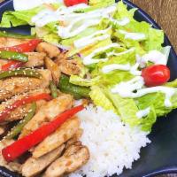 Chicken Teriyaki Over Rice And Salad · 