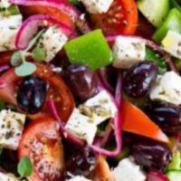 Greek Salad · Crispy romaine lettuce, tomatoes, onion, feta cheese, Kalamata olive, olive oil, and stuffed...