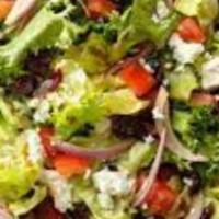 Tossed Salad · Lettuce, tomatoes, cucumbers, onion, shredded carrots, and kalamata olive.