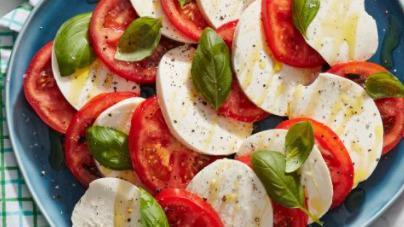 Caprese Salad · Spring greens, fresh Mozzarella, basil, and tomatoes.