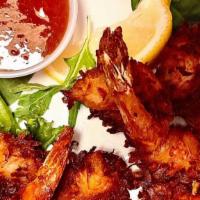 Coconut Shrimp · battered with coconut flakes and served with orange dip