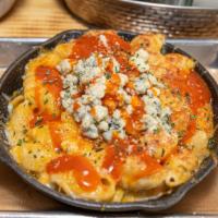 Buffalo Mac · baked macaroni smothered in our house cheese sauce, with crumbled bleu cheese and Wenzel buf...