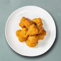 Veggie Pakoras  · Perfectly fried assortment of battered farm-fresh vegetables and herbs.