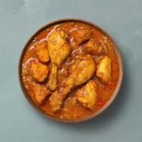 Spice Lane Chicken Curry  · Tender chicken cooked in Indian style with ginger, garlic, onion, and tomato masala. Served ...