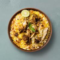 Spice Lane Goat Biryani · Long grain basmati rice cooked with tender goat and aromatic Indian herbs. Served with raita.