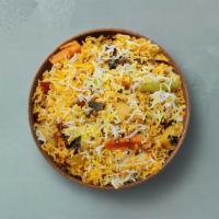 Spice Lane Veggie Biryani · Long grain basmati rice cooked with farm-fresh vegetables and aromatic Indian herbs. Served ...
