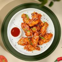 Oriental Special Wings  · Fresh chicken wings, fried until golden brown, and tossed in sweet and sour sauce. Served wi...