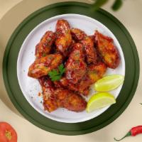 Bee'S Bbq Wings · Fresh chicken wings, fried until golden brown, and tossed in honey and barbecue sauce. Serve...