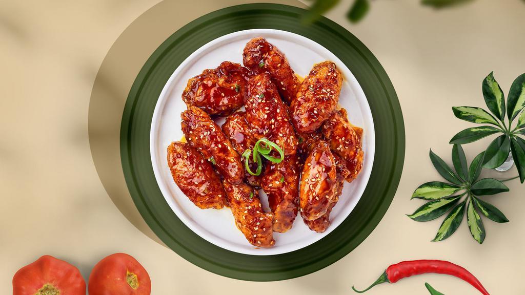 Some Seoul Wings · Fresh chicken wings, fried until golden brown, and tossed in soy sauce, brown sugar, honey, and sesame seeds.
