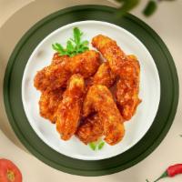 Bbq Buster Tenders · Chicken tenders breaded and fried until golden brown before being tossed in barbecue sauce.