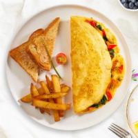 Eve'S Garden Omelette · Eggs cooked with mushrooms, bell peppers, broccoli, tomatoes, and cheddar cheese as an omele...