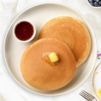 Classic Buttermilk Pancakes · Three pieces of fluffy buttermilk pancakes cooked with care and love and served with butter ...