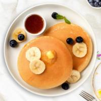 Fruit Fave Pancakes · Three buttermilk pancakes loaded with your choice of fruit.