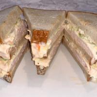 Sloppy Joe · Three layers of rye, Russian dressing, your choice of meat, Swiss cheese and cole slaw. Ham ...