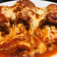 Eggplant Rollatini · Baked with cheese.