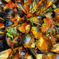 Mussels Marinara · Mollusk with a seasoned tomato sauce.