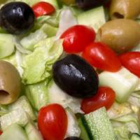 House Salad · Lettuce, cucumbers, olives & tomatoes.