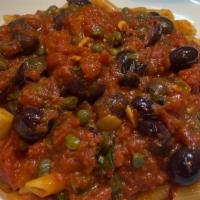 Puttanesca · Capers, olives & anchovies in a spicy marinara.