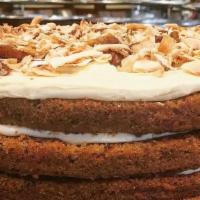 Big Carrot Cake · Six layers of incredibly moist carrot cake sandwiched with smooth cream cheese icing all stu...