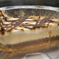 Chocolate Peanut Butter Pie · Dark chocolate and peanut butter mousse full of Reese's peanut butter cups