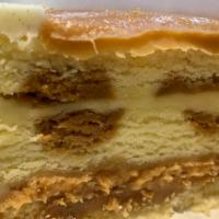 Salted Caramel Vanilla Crunch Cake · Light, buttery vanilla-flecked cake has waves of caramel cake layered with salted caramel cr...