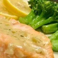 Baked Salmon  · 10oz, Baked Salmon topped with dijon sauce , served with a side of sautéed broccoli or spina...