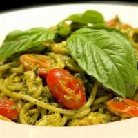 Spaghetti Basil  · In a creamy basil pesto sauce with grilled chicken and cherry tomatoes.