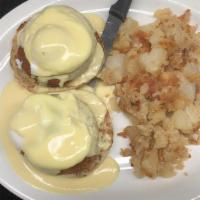Crab Cake Benedicts · topped with Hollandaise Sauce