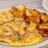 Western Omelette Breakfast · Served with home fries and choice of toast.